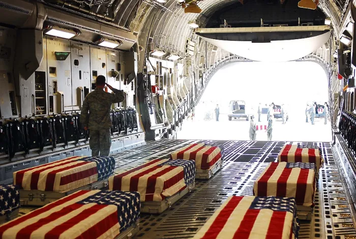 Framed Print : Flag draped coffins of five US soldiers killed at Fort Hood. 13 were killed and 38 injured on Nov