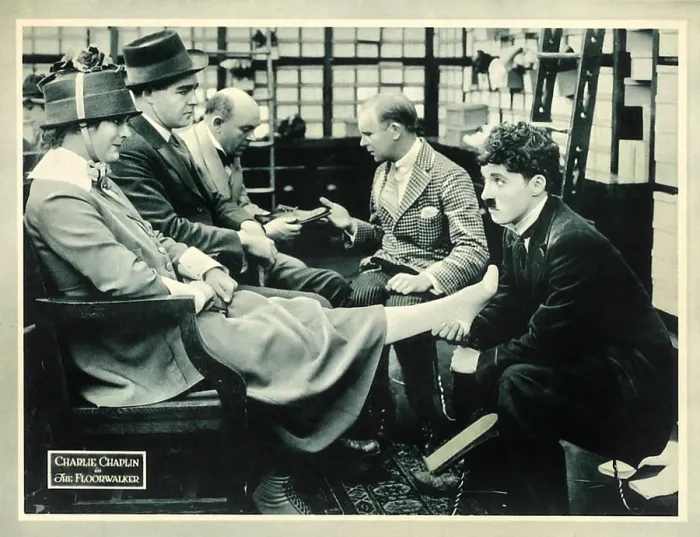 Framed Print : THE FLOORWALKER, right: Charlie Chaplin on lobbycard, 1916 Framed Print : THE FLOORWALKER, right: Charlie Chaplin on lobbycard, 1916