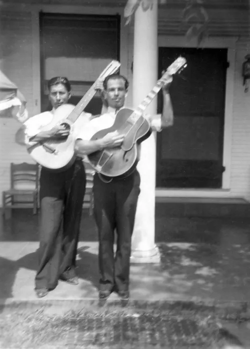 Framed Print : Folk Music. Lolo Mendoza and Chico Real, with guitars, at the home of Mrs. Sarah Kleberg Shelton, Kingsville, Texas. Ruby Lomax, photographer, 1940