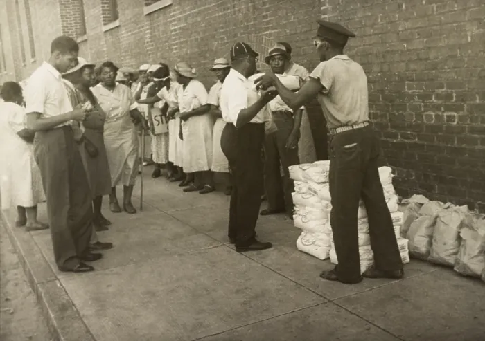 Framed Print : Food handed out to striking African American tobacco workers. Richmond, VA. 1938. In the 1930s and 1940s civil rights unionism supported tobacco workers. (BSLOC_2013_6_90) Framed Print : Food handed out to striking African American tobacco workers. Richmond, VA. 1938. In the 1930s and 1940s civil rights unionism supported tobacco workers. (BSLOC_2013_6_90)