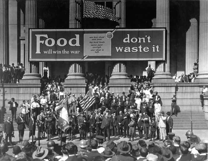 Framed Print : Food Will Win The War. Don't Waste It, exhorts the banner at a rally for the Fourth Liberty Loan Campaign during World War I. New Orleans, October 2, 1918