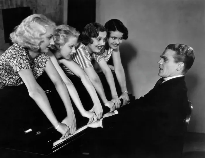 Framed Print : FOOTLIGHT PARADE, James Cagney, getting his fingers slammed by chorus girls, 1933