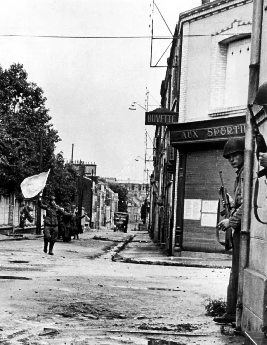 Framed Print : FRANCE--Defenders of a pillbox guarding a street in Cherbourg, German soldiers surrender, waving a white flag, after being knocked out of their position by allied tank fire Framed Print : FRANCE--Defenders of a pillbox guarding a street in Cherbourg, German soldiers surrender, waving a white flag, after being knocked out of their position by allied tank fire