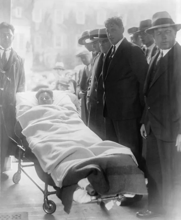 Framed Print : Francis Two Gun Crowley (1911-1932), a robber and cop killer, arrives at his arraignment in a gurney