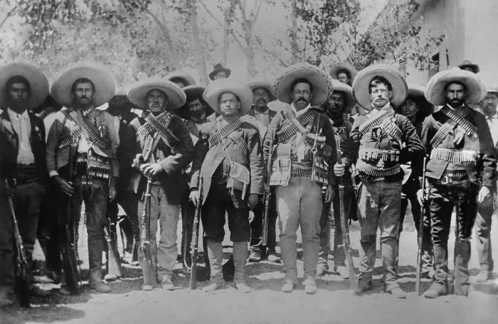 Framed Print : Francisco Pancho Villa and his officers after placing his soldiers under Maderos command. Villa is third from right at Maderos family estate, Hacienda Bustillos, c