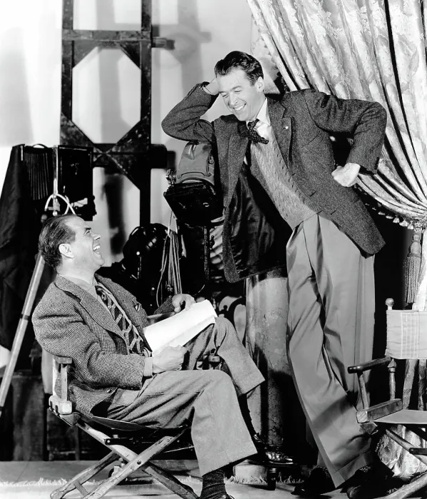 Framed Print : Frank Capra, James Stewart on the set of IT'S A WONDERFUL LIFE, 1946
