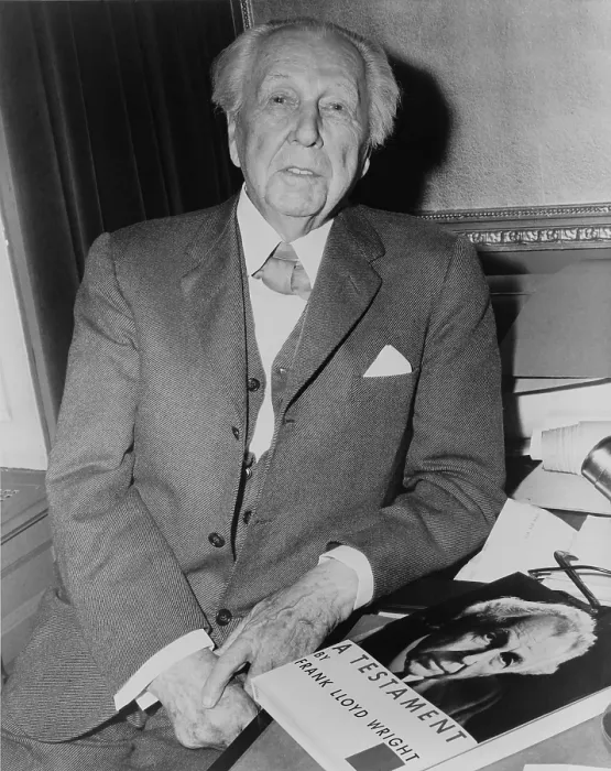 Framed Print : Frank Lloyd Wright (1867-1959), American architect with his 1957 book, A TESTAMENT, an artistic autobiography and summation of his design principles Framed Print : Frank Lloyd Wright (1867-1959), American architect with his 1957 book, A TESTAMENT, an artistic autobiography and summation of his design principles