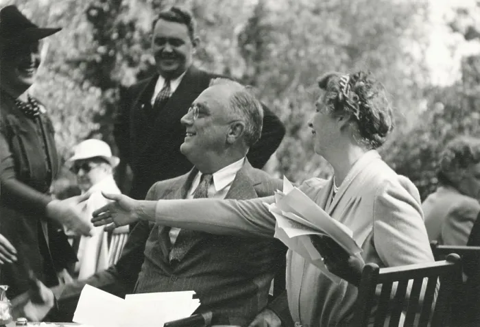 Framed Print : Franklin and Eleanor Roosevelt at a high school dedication. Hyde Park. Oct. 5, 1940. The First Lady reaches for the hand of Mrs