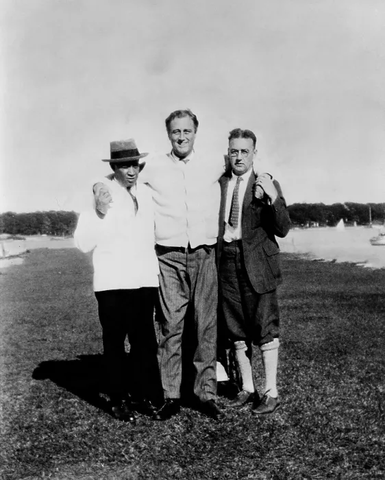 Framed Print : Franklin Roosevelt, his legs paralyzed by polio, standing with assistance in 1924. He is supported by Dr. Macdonald and his valet in Marion, Mass. (BSLOC_2013_5_53) Framed Print : Franklin Roosevelt, his legs paralyzed by polio, standing with assistance in 1924. He is supported by Dr. Macdonald and his valet in Marion, Mass. (BSLOC_2013_5_53)