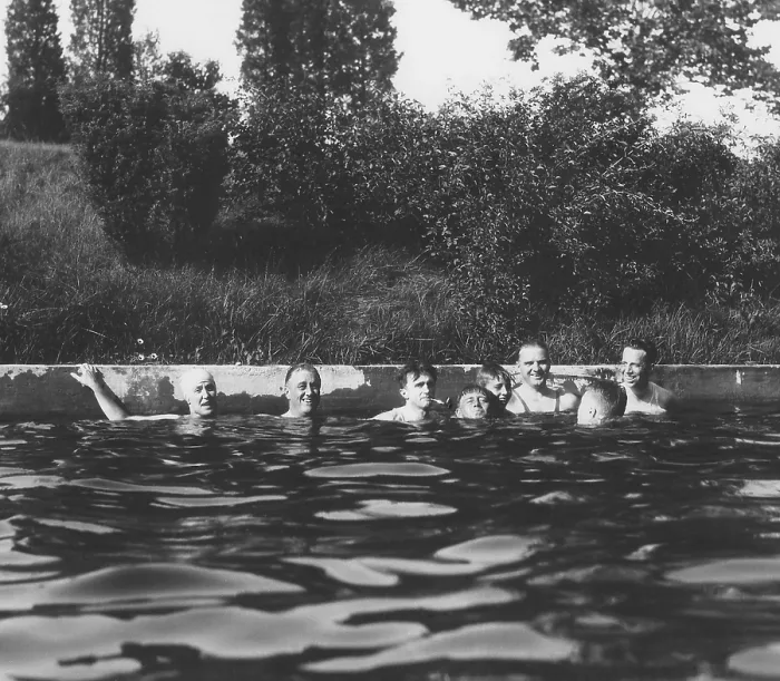 Framed Print : Franklin Roosevelt and Missy Lehand (left) with others in Hyde Park pool. 1930