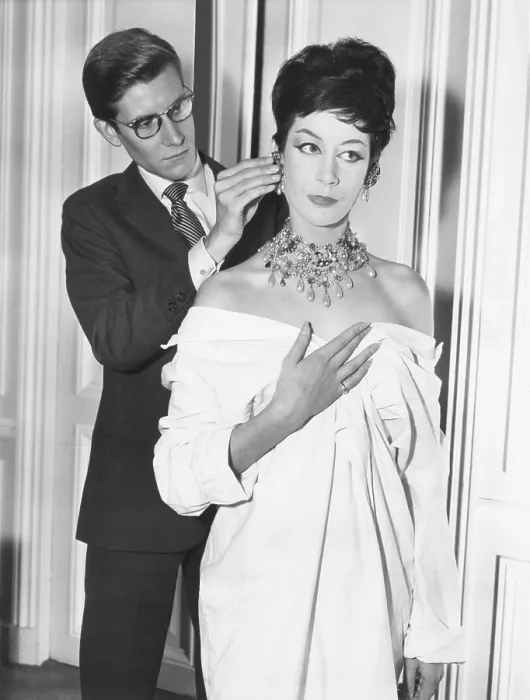 Framed Print : French fashion designer Yves Saint Laurent putting earing on model. Jan. 18, 1962. (CSU_2015_7_380) Framed Print : French fashion designer Yves Saint Laurent putting earing on model. Jan. 18, 1962. (CSU_2015_7_380)