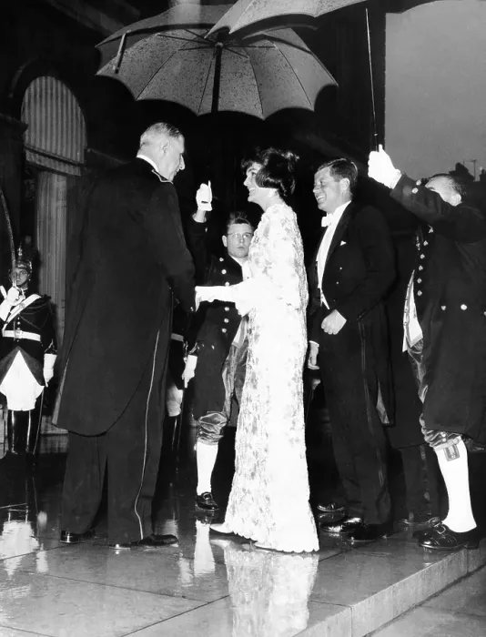 Framed Print : French President Charles de Gaulle (left), greets President John and Jacqueline Kennedy at the Elysee Palace. Under the umbrellas, De Gaulle is in his dress uniform, and Mrs