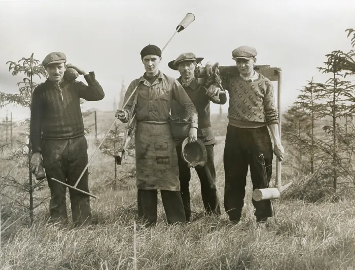 Framed Print : French workers with unexploded shells dug up on the French Frontier zone in 1936. In one day they found a rifle, machine gun, helmet, two shells, and two shell casings