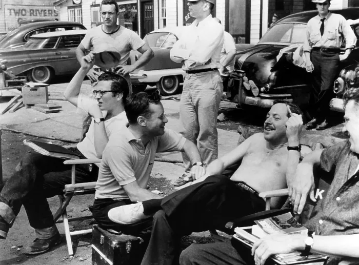 Framed Print : THE FUGITIVE KIND, director Sidney Lumet (wearing glasses, seated left), screenwriter Tennessee Williams (second from right), 1959
