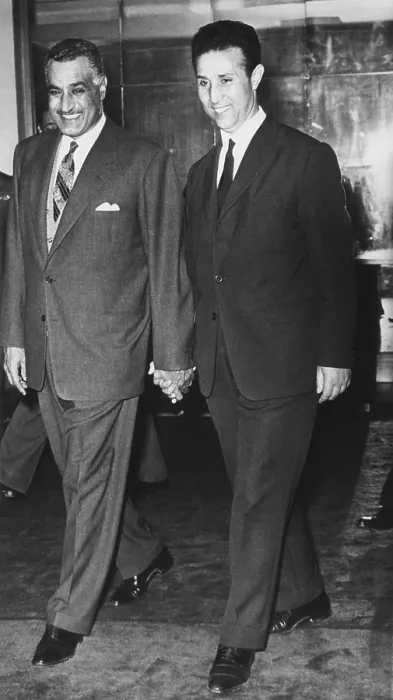 Framed Print : Gamal Abdel Nasser walks hand in hand with Algerian rebel leader Ahmed Ben Bella. April 17, 1962