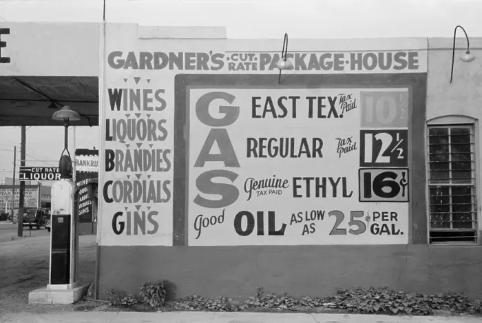 Framed Print : Gardener's Cut Rate Package House sign advertising alcoholic beverages and gasoline prices. Waco, Texas, Nov. 1939 Framed Print : Gardener's Cut Rate Package House sign advertising alcoholic beverages and gasoline prices. Waco, Texas, Nov. 1939