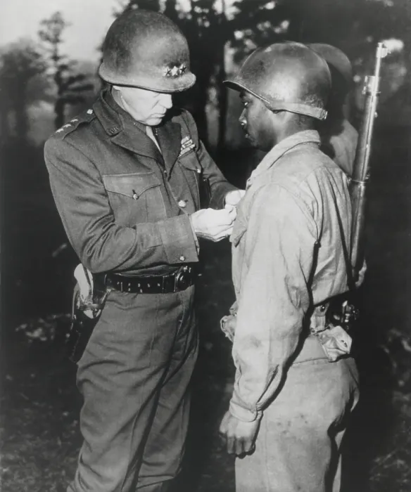 Framed Print : Gen. George Patton, pins the Silver Star on Private Ernest A. Jenkins