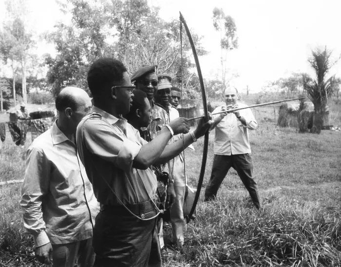 Framed Print : Gen. Joseph Mobutu, Chief of the Congolese Army, demonstrates his skill with bow and arrow. March 23, 1964 Framed Print : Gen. Joseph Mobutu, Chief of the Congolese Army, demonstrates his skill with bow and arrow. March 23, 1964