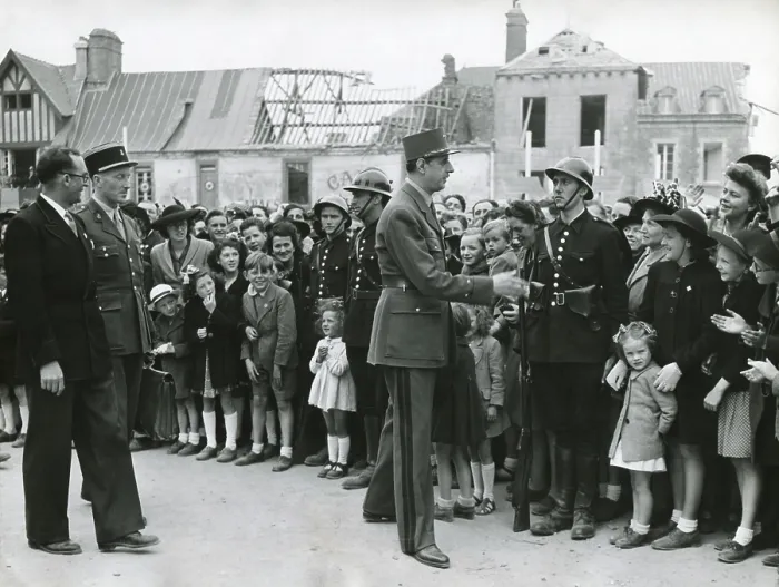 Framed Print : General Charles De Gaulle in Normandy, June 11, 1945. In the background are bombed out buildings. De Gaulle was Chairman of the Provisional Government of the French Republic