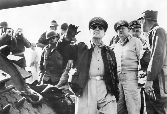 Framed Print : General Douglas MacArthur inspecting troops in the company of other officers and photographers Framed Print : General Douglas MacArthur inspecting troops in the company of other officers and photographers