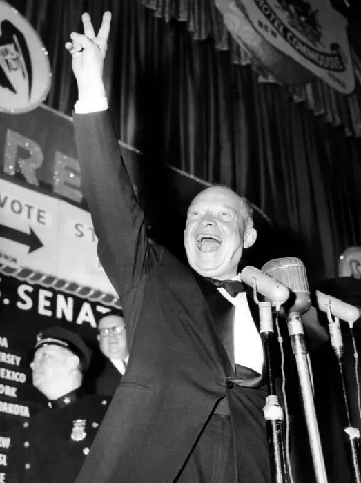 Framed Print : General Dwight D. Eisenhower flashes a victory sign at his Hotel Commodore campaign headquarters after winning the presidential election, November 5, 1952