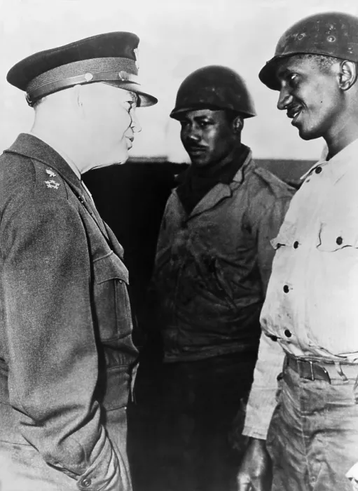 Framed Print : General Dwight Eisenhower talking with two African American soldiers at the supply port of Cherbourg, France. Eisenhower commanded a segregated US military during World War II Framed Print : General Dwight Eisenhower talking with two African American soldiers at the supply port of Cherbourg, France. Eisenhower commanded a segregated US military during World War II