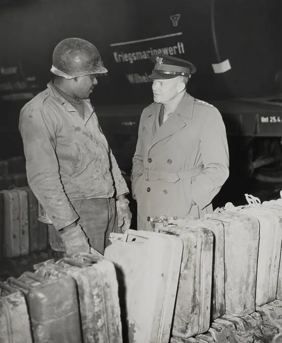Framed Print : General Dwight Eisenhower talks with African American Private Edward Clay. Clay is stationed at a gas dump on the Western Front