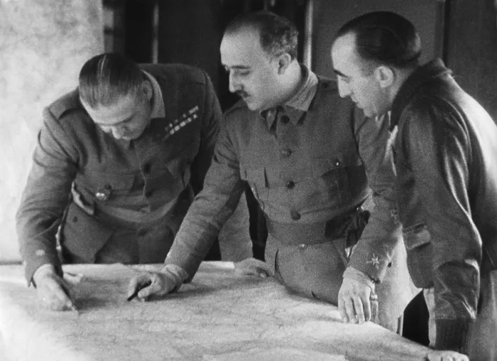 Framed Print : General Franco with two leaders of the battles in the Terual front. Fighting at Alfambra resulted in a victory for the Nationalists, Feb 5-8, 1938 Framed Print : General Franco with two leaders of the battles in the Terual front. Fighting at Alfambra resulted in a victory for the Nationalists, Feb 5-8, 1938