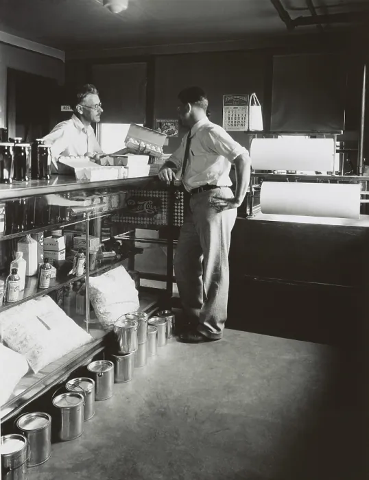 Framed Print : General store shopkeeper and customer, Ohio, Aug. 1931. The store has a modest inventory with Pepsi sign the only big brand offered. (BSLOC_2013_7_108)