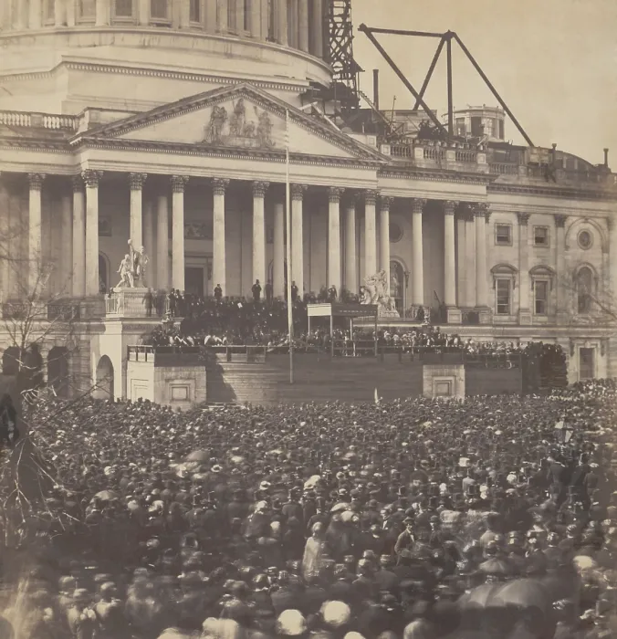Framed Print : General view of Inauguration of Mr. Lincoln, March 4, 1861. Lincoln is standing under the wood canopy, with his face in shadow but his white shirt front is visible