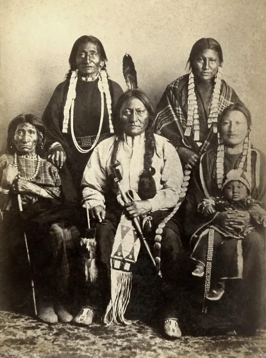 Framed Print : Four generations of Sitting Bulls family at Fort Randall in 1882. The warrior chief sits with a sister, two wives, a daughter, her daughter, and her baby Framed Print : Four generations of Sitting Bulls family at Fort Randall in 1882. The warrior chief sits with a sister, two wives, a daughter, her daughter, and her baby