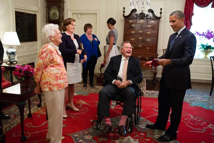 Framed Print : George H. W. and Barbara Bush present President Barack Obama with a pair of colorful socks. July 15, 2013 Framed Print : George H. W. and Barbara Bush present President Barack Obama with a pair of colorful socks. July 15, 2013