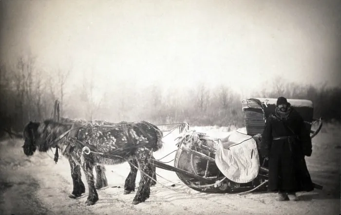 Framed Print : George Kennan (1845-1924), American writer, in furs next to a Siberian posting sledge on a cold morning