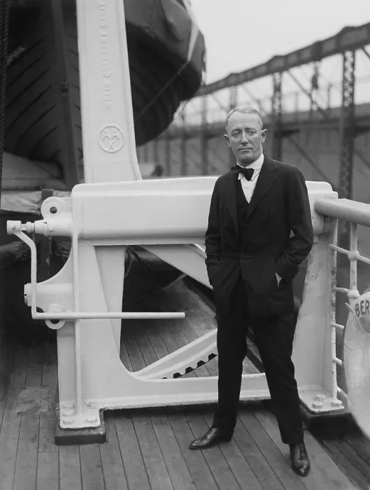 Framed Print : George M. Cohan (1878-1942), poses for photographers on the deck of an ocean liner in the port of New York, ca. 1920
