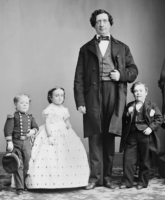 Framed Print : George Nut, Charles Stratton (aka Tom Thumb), Lavinia Warren Stratton, and The Giant, c. 1863-65. All were performers for P.T