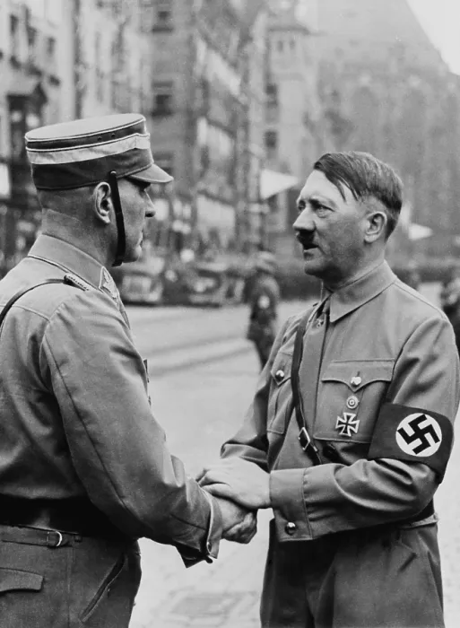 Framed Print : German Chancellor, Adolf Hitler, shaking hands with a Brownshirt at Nazi Party Day. Nuremberg, 1937. (BSLOC_2014_8_166)