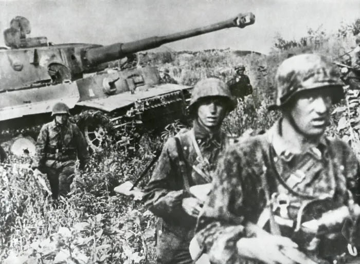 Framed Print : German Infantry in camouflaged clothing retreating with a tank on the Kuban Front