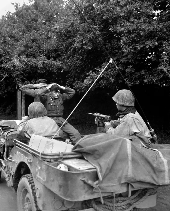 Framed Print : Two German prisoners guarded by the Free French Infantry of the 6th Armored Div. Plouay, Brittany, France. August 28, 1944. World War 2. (BSLOC_2014_8_92)