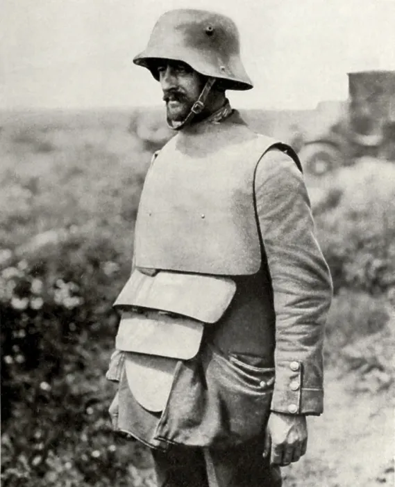 Framed Print : German soldier in metal helmet design of 1916 and old fashioned body armor. 1916-18. (BSLOC_2013_5_46)