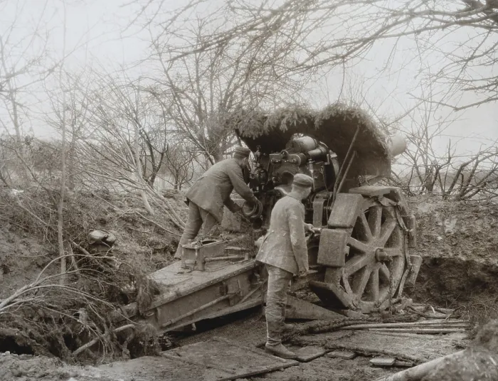 Framed Print : German Soldiers at a camouflaged Howitzer during World War 1. 1914-15. Artillery was the major weapon of WW1, accounting for 60% of casualties. (BSLOC_2013_5_47)