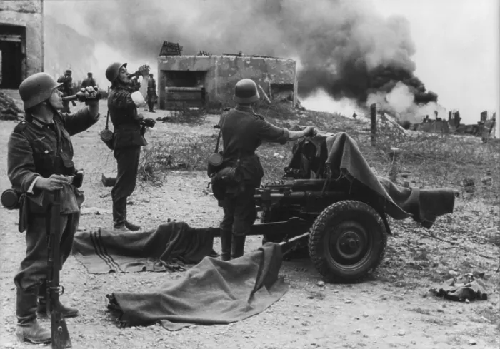 Framed Print : German soldiers drink beer during the burning of Dieppe, France. World War 2, Battle of France, May 10-June 21, 1940. (BSLOC_2014_7_65)