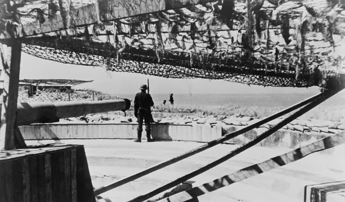 Framed Print : German soldiers guarding camouflage covered gun batteries on the Atlantic Wall. Ca. 1943-44. World War 2. (BSLOC_2014_10_73) Framed Print : German soldiers guarding camouflage covered gun batteries on the Atlantic Wall. Ca. 1943-44. World War 2. (BSLOC_2014_10_73)