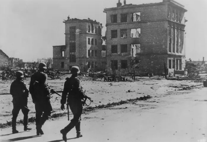 Framed Print : Three German soldiers walking in desolate street in the ruins of Stalingrad in Sept. 1942. The battle had begun on August 23, 1942, with German Luftwaffe bombing