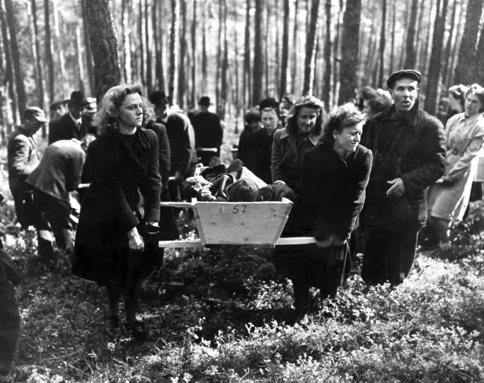 Framed Print : German women carry a corpse from in the woods near Neunburg, Germany
