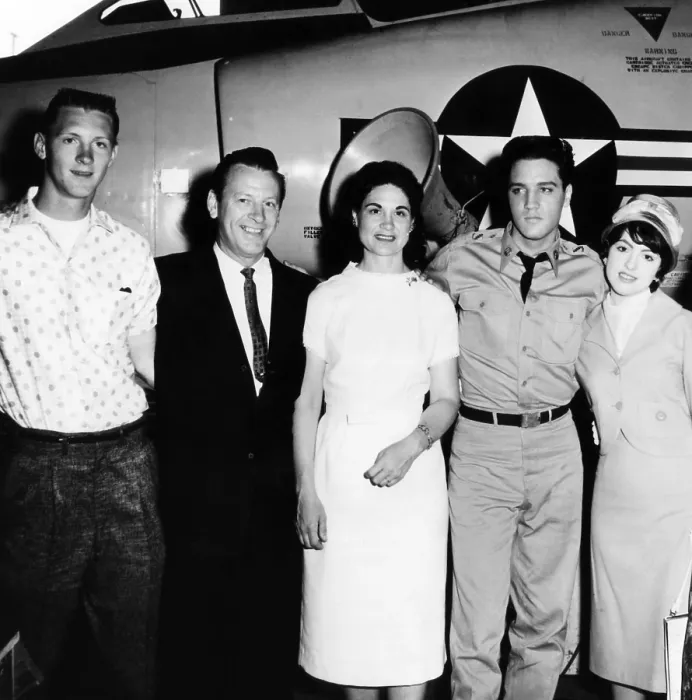Framed Print : G.I. BLUES, Elvis Presley (second from right) visited by country singers Kitty Wells (center) and her husband Johnnie Wright (second from left), their son Bob Wright (far left)