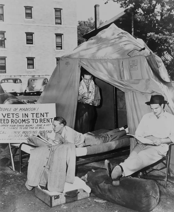 Framed Print : Three GI students at the University of Wisconsin living in a tent. They have posted a sign, People of Madison! Vets in tent need rooms to rent'. 1947. (BSLOC_2014_13_17)
