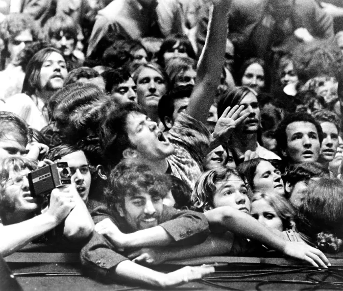 Framed Print : GIMME SHELTER, fans in the audience watching the Rolling Stones concert at Altamont Speedway, in December 1969. Documentary was released in 1970