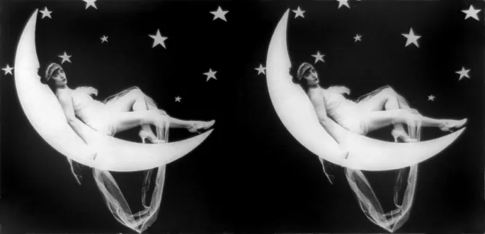 Framed Print : The Girl in the Moon, stereo view of a scantily clad woman laying back in a crescent moon, 1923 Framed Print : The Girl in the Moon, stereo view of a scantily clad woman laying back in a crescent moon, 1923