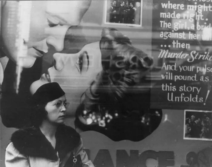 Framed Print : Girl and movie poster, Cincinnati, Ohio, photograph by John Vachon, October, 1938