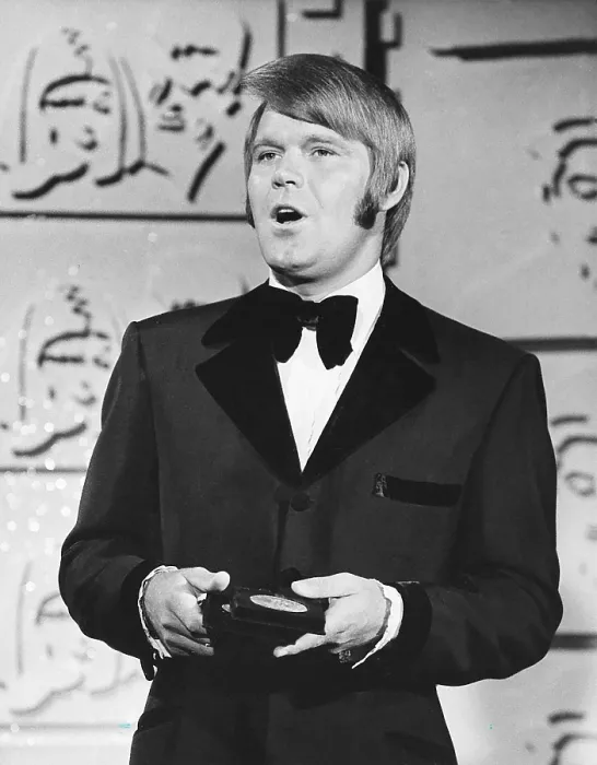 Framed Print : Glen Campbell, receiving CMA (aka Country Music Association) award, ca. late 1960s-early 1970s Framed Print : Glen Campbell, receiving CMA (aka Country Music Association) award, ca. late 1960s-early 1970s